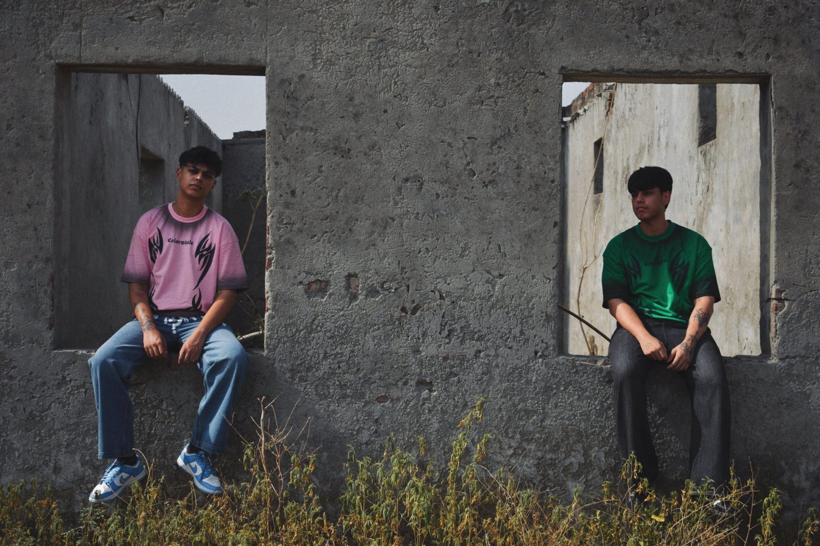 Designers collaborating over a sketchbook